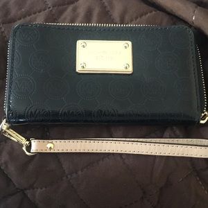 Black and Gold Michael Kors wristlet